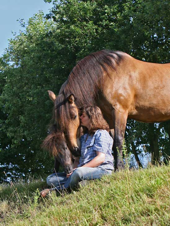 Participants sitting on hillside